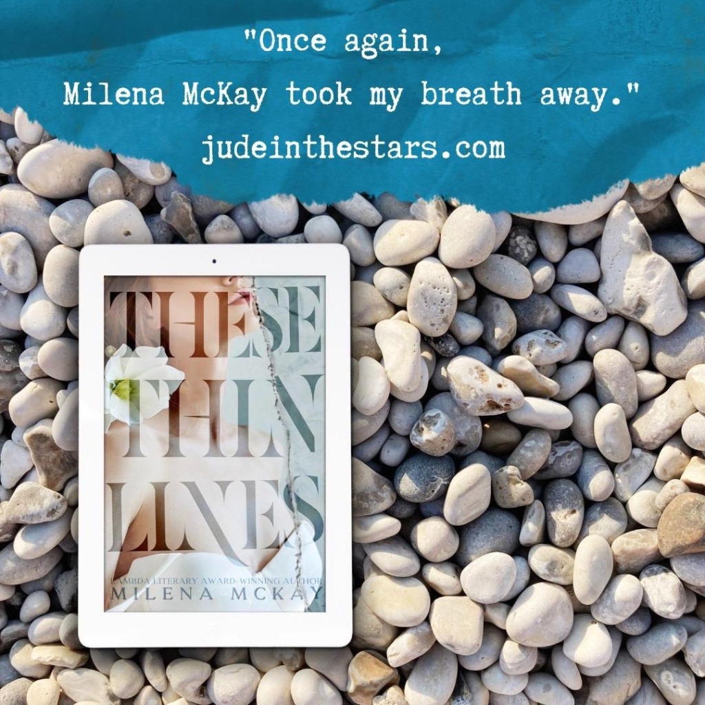 On a backdrop of beach pebbles, an iPad with the cover of These Thin Lines by Milena McKay. At the top of the image, a strip of torn paper with a quote: "Once again, Milena McKay took my breath away." and a URL: judeinthestars.com.