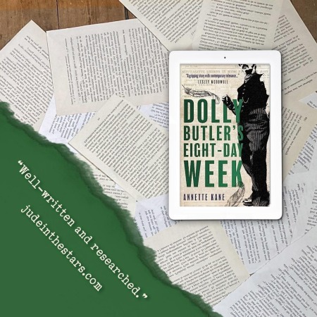 On a backdrop of book pages, an iPad with the cover of Dolly Butler's Eight-Day Week by Annette Kane. In the bottom left corner of the image, a strip of torn paper with a quote: "Well-written and researched." and a URL: judeinthestars.com.