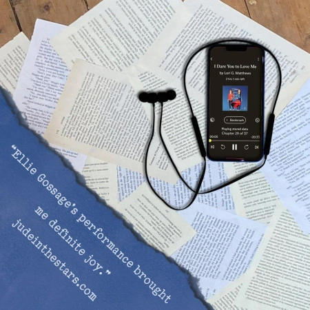 On a backdrop of book pages, an iPhone with the cover of I Dare You to Love Me by Lori G. Matthews, narrated by Ellie Gossage. In the bottom left corner of the image, a strip of torn paper with a quote: "Ellie Gossage’s performance brought me definite joy." and a URL: judeinthestars.com.
